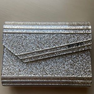 JIMMY CHOO
Candy glittered acrylic clutch
